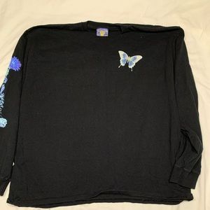 A black butterfly plant shirt